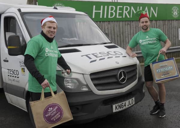 Neil Lennon and Darren McGregor publicise Hibs partnership with Tesco which will serve lunches to those in need on Christmas Day. Picture: Neil Hanna.