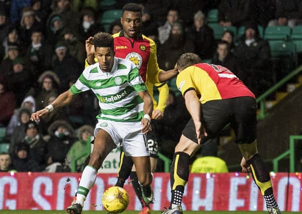 Celtic's Scott Sinclair takes on Patrick Thistle's Danny Devine. Picture: Rob Casey/SNS