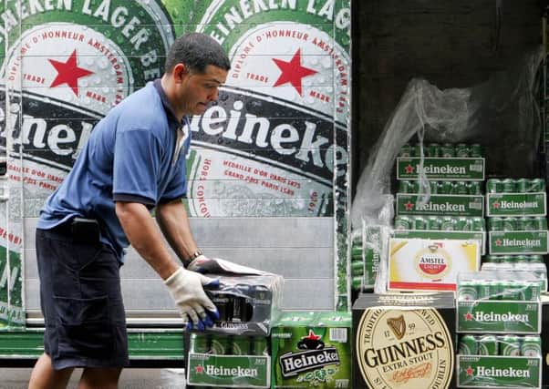 Heineken insisted that it 'makes sense' to have rival beers in its bars. Picture:Mark Lennihan/AP