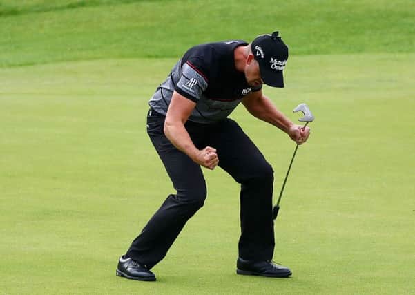 Sweden's Henrik Stenson celebrates after winning The Open at Royal Troon. Picture: Matthew Lewis/Getty Images