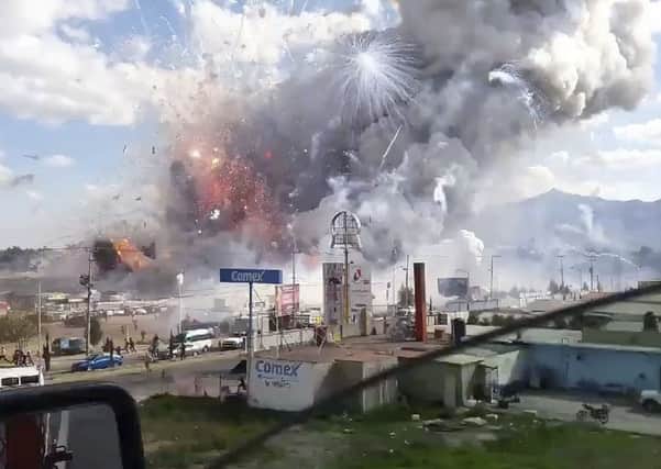 This image, recorded from a passing car, shows an explosion ripping through the San Pablito fireworks market in Tultepec, Mexico. Picture: Jose Luis Tolentino via AP