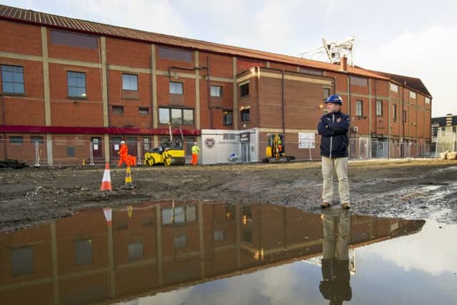 Former Hearts striker John Robertson pictured outside Tynecastle's main stand which will soon be rebuilt. Picture Ian Rutherford