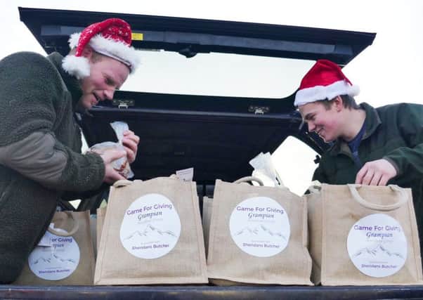 Grampian Moorland Group gamekeepers prepare Christmas food parcels for delivery to vulnerable people in Grampian and Angus. Picture: Contributed