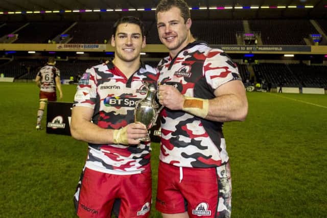Sam Hidalgo-Clyne, left, and Allan Dell celebrate Edinburgh's 1872 Cup success last season. Picture: Paul Devlin/SNS/SRU