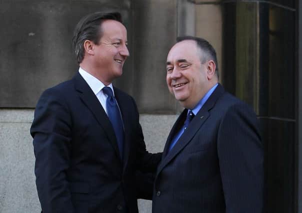 David Cameron and Alex Salmond were both pushed into holding referendums by winning majority governments. Picture: Getty Images