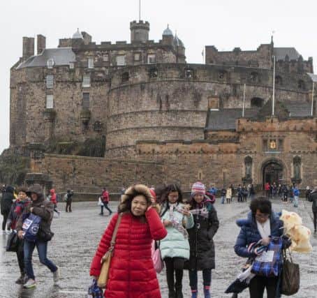 Edinburgh Castle is closed due to safety concerns from he high winds as Storm Barbara hits much of the U.K. The Met office have issued a  weather warning for severe gales and heavy rain which will affect the north-west from the start. The wet and very windy weather will spread south and east across the country later in the day, but become less severe.