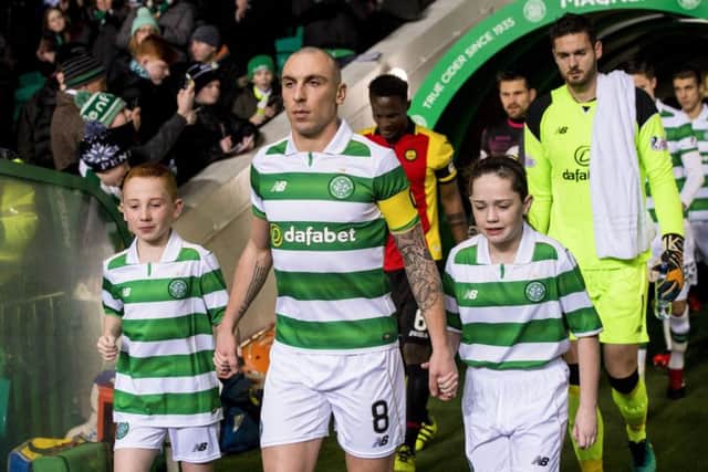 Celtic captain Scott Brown leads his team out of the tunnel before their midweek win over Partick Thistle. Picture: SNS Group