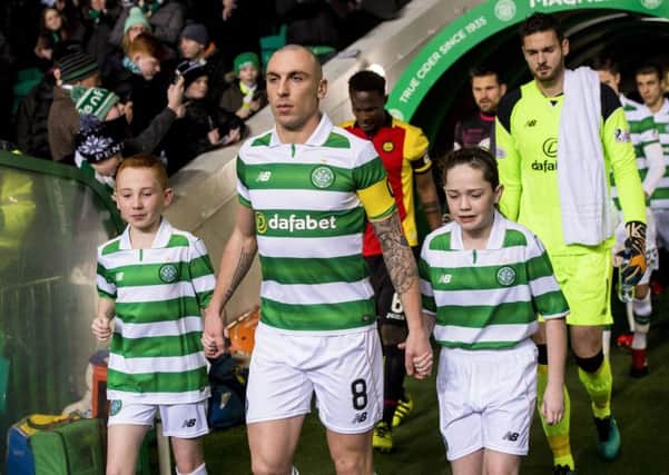 Celtic captain Scott Brown leads his team out of the tunnel before their midweek win over Partick Thistle. Picture: SNS Group