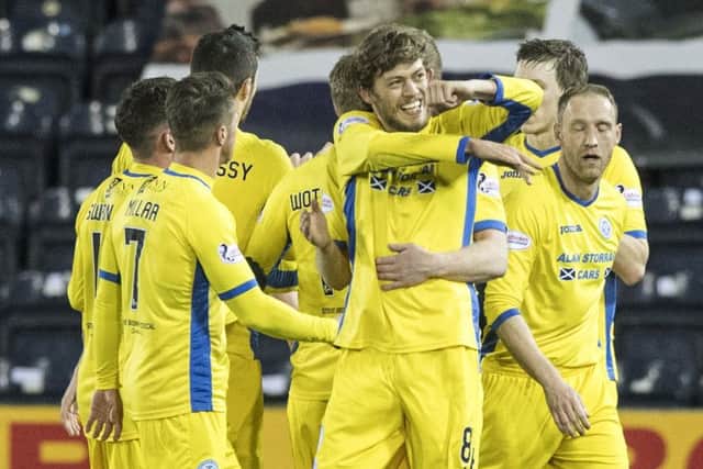 St Johnstone's Murray Davidson, centre, celebrates after scoring the only goal of the night at Rugby Park. Picture: SNS Group