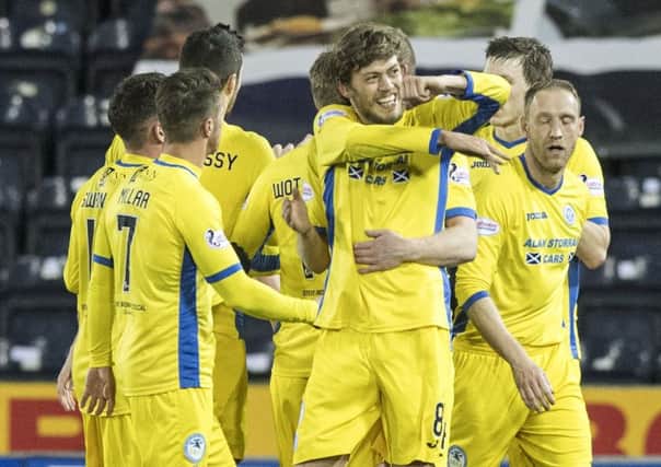 St Johnstone's Murray Davidson, centre, celebrates after scoring the only goal of the night at Rugby Park. Picture: SNS Group