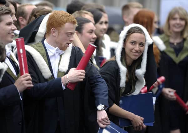 Graduates are paying more for their qualifications - but the situation is worse south of the Border. Picture: Neil Hanna