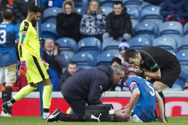 Rangers' Lee Wallace receives treatment during the match versus Inverness at Ibrox. Picture: Rob Casey