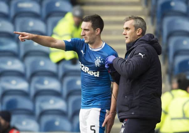 Lee Wallace after receiving treatment during Saturday's win over Inverness CT. Picture: SNS