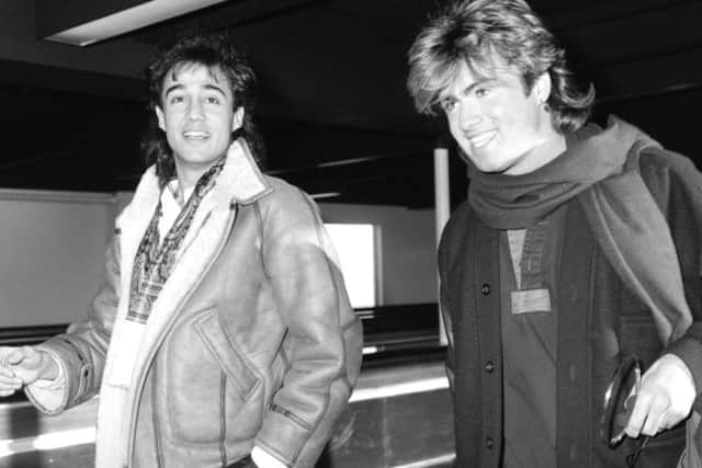 Andrew Ridgeley, left, with Michael before the pair embarked on a Wham tour of Japan. Picture: PA