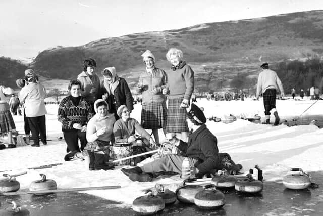 The 1979 Grand match on Lake of Menteith.Women from Dallas & Scotscraig Club enjoy a picnic lunch on the ice. PIC Royal Caledonian Curling Club.