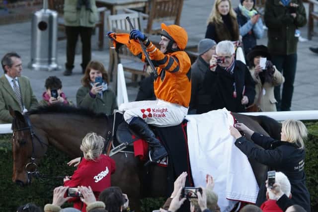 Tom  Scudamore  celebrates as Thistlecrack heads for  the winners enclosure. Picture: Getty.