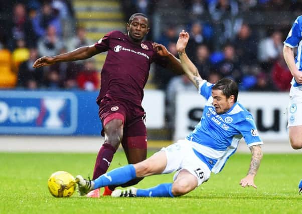 Arnaud Djoum believes he played his best game in a Hearts jersey in spite of losing 3-2 at Dundee. Picture: SNS.
