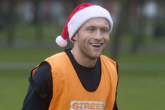 Hibs' Dylan McGeouch helped Street Soccer Scotland host a football match to help reduce isolation on Christmas Day. Picture: Craig Foy/SNS