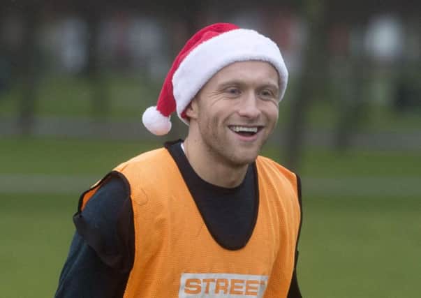 Hibs' Dylan McGeouch helped Street Soccer Scotland host a football match to help reduce isolation on Christmas Day. Picture: Craig Foy/SNS