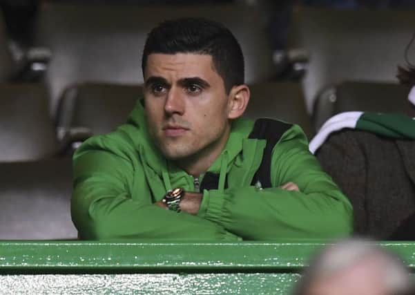Celtic's Tom Rogic watches the win over Ross County from the stand. Picture: Craig Williamson/SNS