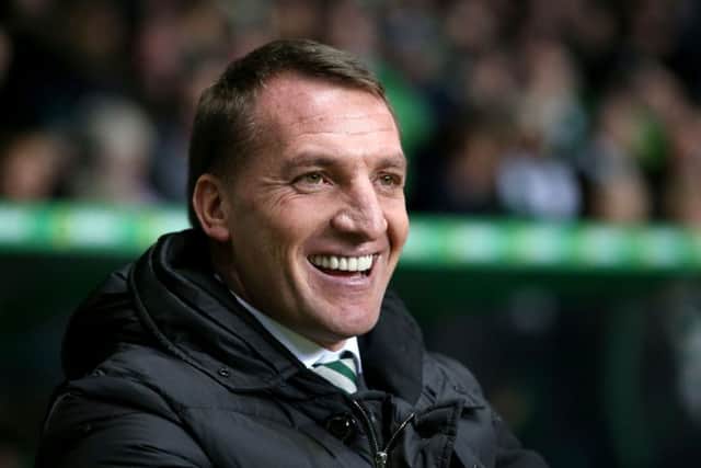 Celtic boss Brendan Rodgers watched his side record their 14th straight league win against Ross County. Picture: PA