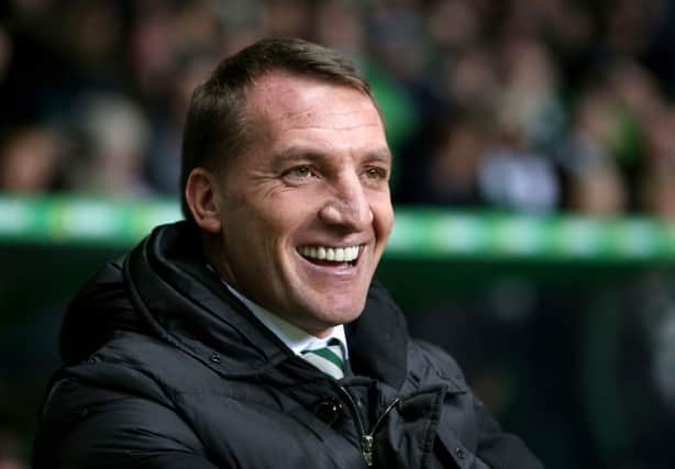 Celtic boss Brendan Rodgers watched his side record their 14th straight league win against Ross County. Picture: PA