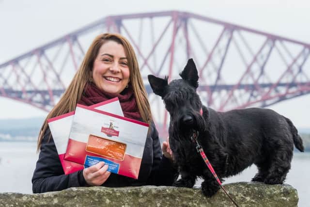 Asda fresh food buyer June Rose displays Scotty Brand's salmon products. Picture: Ian Georgeson