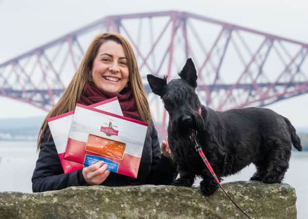 Asda fresh food buyer June Rose displays Scotty Brand's salmon products. Picture: Ian Georgeson