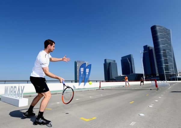 Andy Murray hits a return to Rafeal Nadal during the launch of 2016 Mubadala Tennis Championship at Al Maryah Island in Abu Dhabi.  Picture: Francois Nel/Getty Images