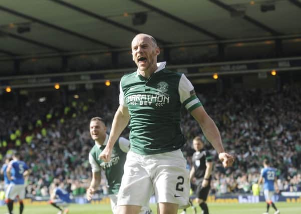 David Gray celebrates his dramatic late winner
against Rangers which delivered the Scottish Cup to Hibs for the first time since 1902. Picture: Greg Macvean