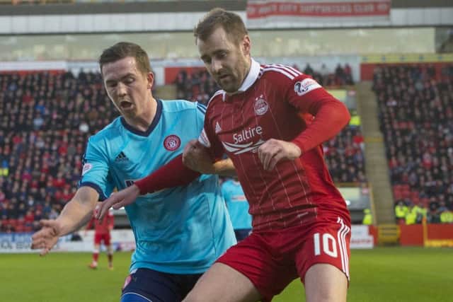 Aberdeen and Northern Ireland winger Niall McGinn, right, knows Austin MacPhee will be looking for weaknesses in the Dons' defence and attack.