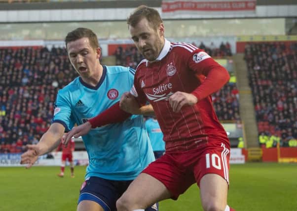 Aberdeen and Northern Ireland winger Niall McGinn, right, knows Austin MacPhee will be looking for weaknesses in the Dons' defence and attack.
