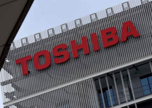 Toshiba shares have almost halved in value. Picture: Toru Yamanaka//AFP/Getty Images