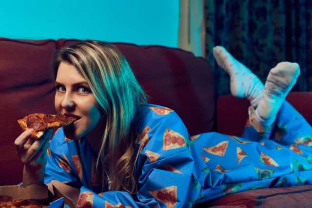 Domino's in Shawlands is one of only two stockists of the 'wipeable' onesie. Picture: Mikael Buck/Domino's