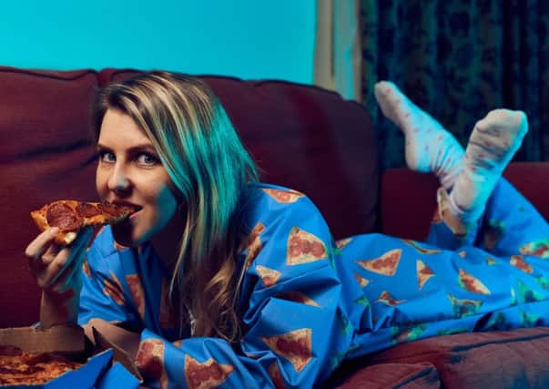 Domino's in Shawlands is one of only two stockists of the 'wipeable' onesie. Picture: Mikael Buck/Domino's