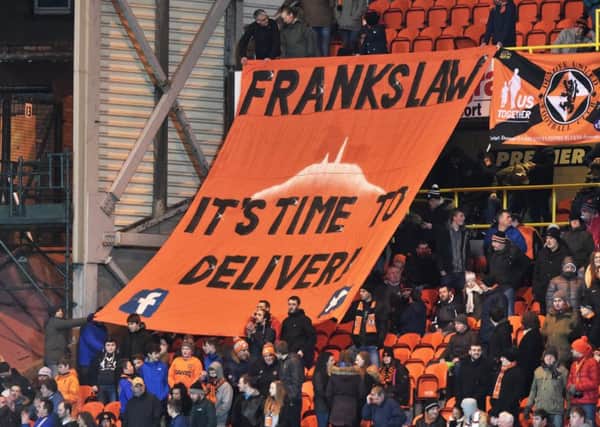 At Tannadice a banner appeals for free care for dementia sufferers under 65 in the name of former Dundee United player Frank Kopel. Picture: Alan Harvey/SNS
