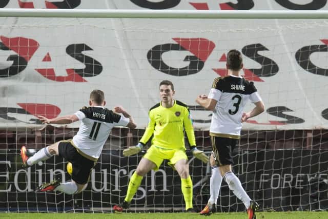 Aberdeen's Jonny Hayes volleys his side in front at Tynecastle. Picture: SNS