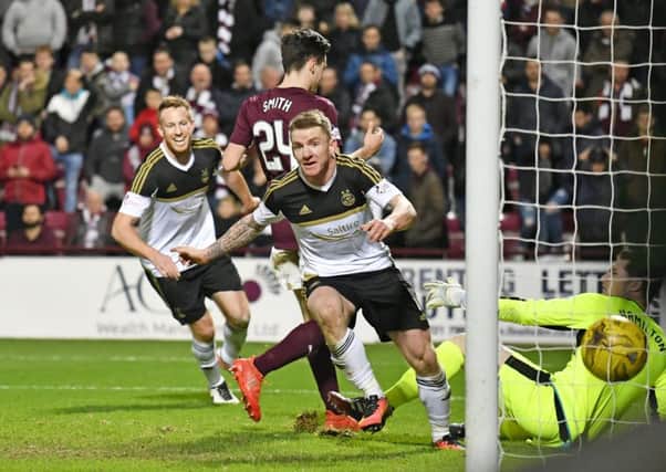Jonny Hayes wheels away after volleying Aberdeen in front against Hearts at Tynecastle. Picture: Rob Casey/SNS