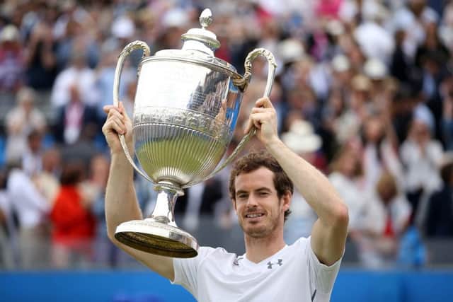 Andy Murray celebrates with the trophy after winning the Aegon Championships at Queen's Club in June. Picture: Steve Paston/PA Wire