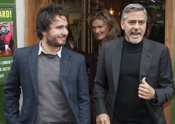 Social Bite co-founder Josh Littlejohn, pictured with actor George Clooney on a visit to Edinburgh, will receive an MBE. Picture: Phil Wilkinson/TSPL