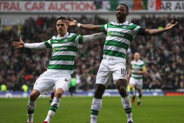 Moussa Dembele, right, celebrates scoring Celtic's first goal. Picture: Ian MacNicol/Getty Images
