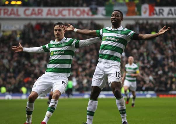 Moussa Dembele, right, celebrates scoring Celtic's first goal.  Picture: Ian MacNicol/Getty Images