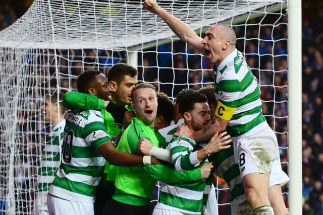 Celtic celebrate taking the lead at Ibrox. Full time result Rangers 1 Celtic 2. Picture; getty