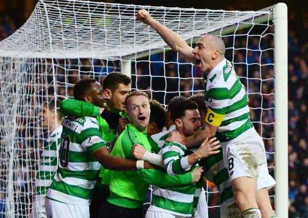 Celtic celebrate taking the lead at Ibrox. Full time result Rangers 1 Celtic 2. Picture; getty