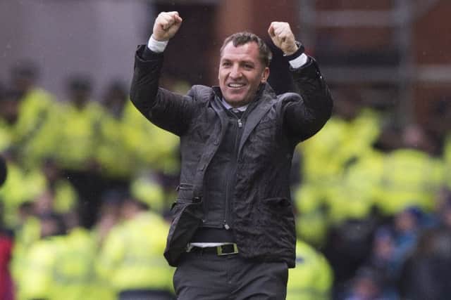 Celtic manager Brendan Rodgers celebrates his side's 2-1 victory at Ibrox. Picture: Alan Harvey/SNS