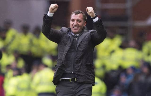 Celtic manager Brendan Rodgers celebrates his side's 2-1 victory at Ibrox. Picture: Alan Harvey/SNS