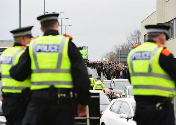 Police officers stand outside Ibrox. Picture; Getty