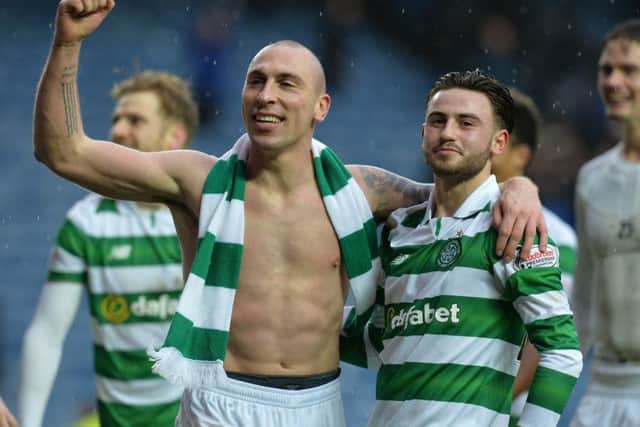 Scott Brown of Celtic celebrates at the final Whistle with team-mate Patrick Roberts. Picture: Mark Runnacles/Getty