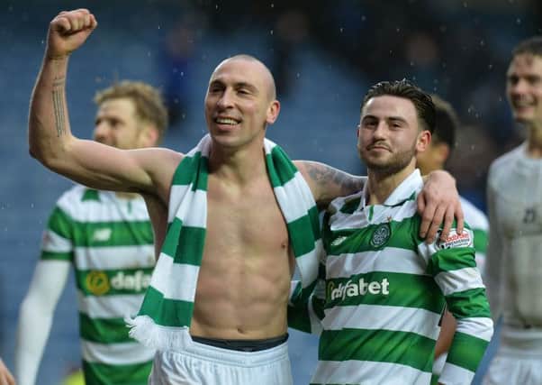 Scott Brown of Celtic celebrates at the final Whistle with team-mate Patrick Roberts. Picture: Mark Runnacles/Getty