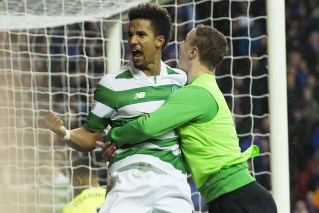 Celtic's Scott Sinclair celebrates his goal with substitute Leigh Griffiths. Picture: Alan Harvey/SNS